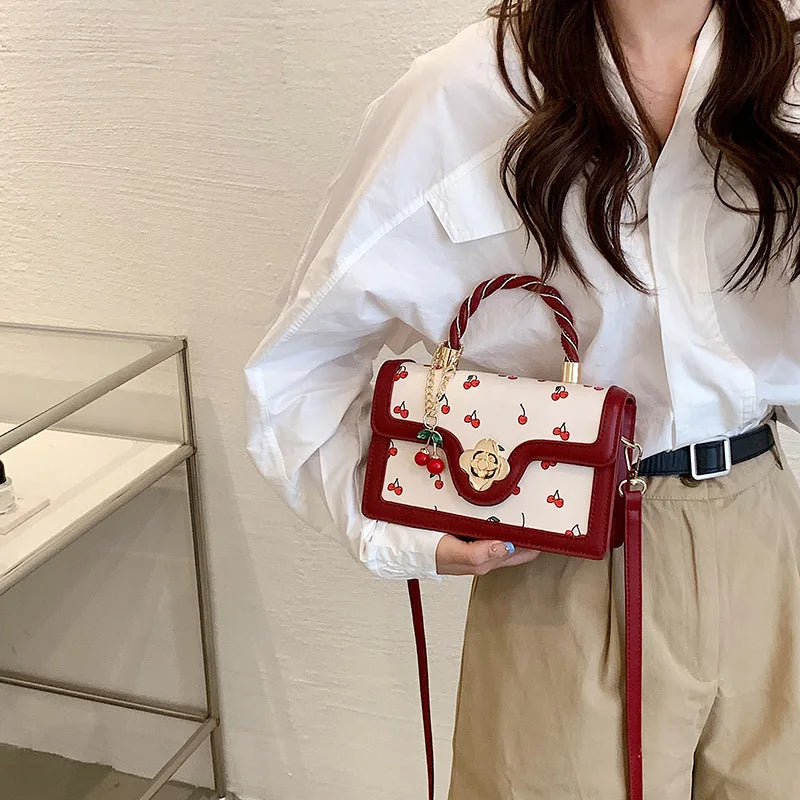 This Is a Red Handbag with a Cute Cherry Design for Dating and