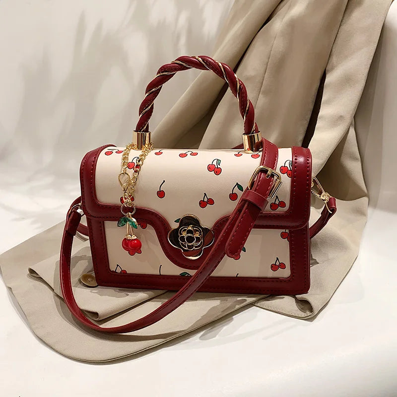 This Is a Red Handbag with a Cute Cherry Design for Dating and