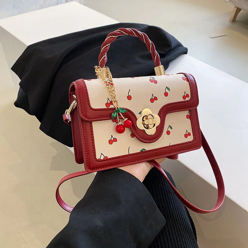 This Is a Red Handbag with a Cute Cherry Design for Dating and